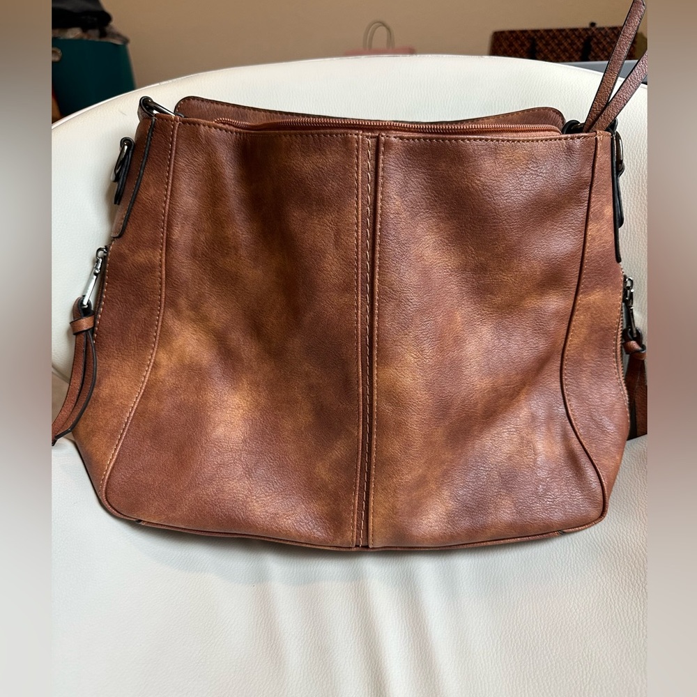Big brown purse lots of room and pockets
